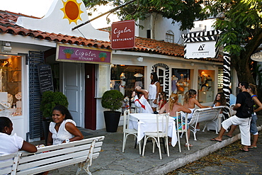 People at a restaurant on the Rua das Pedras, Buzios, Rio de Janeiro State, Brazil, South America