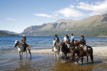 Horseback riding by Guttierez Lake in Estancia Peuma Hue, Patagonia, Argentina, South America