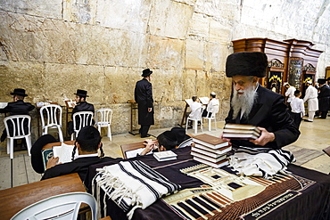 Orthodox Jewish people praying at a synagogue by the Western Wall (Wailing Wall) in the Old City, Jerusalem, Israel, Middle East