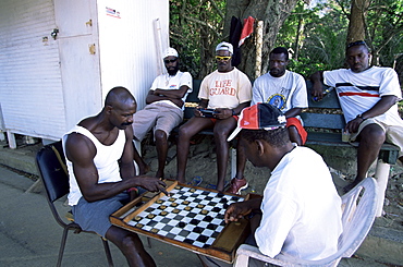 Fishermen playing checkers, Charlotteville, Tobago, West Indies, Caribbean, Central America