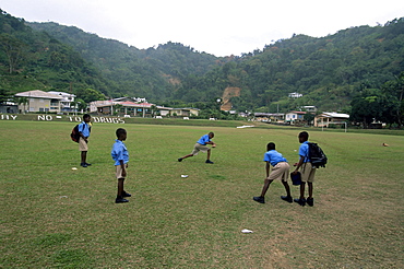 Boys playing cricket at Charlotteville, Tobago, West Indies, Caribbean, Central America