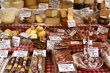 Cheese and salamis at Papiniano market, Milan, Lombardy, Italy, Europe