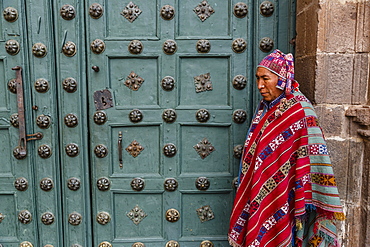 The entrance door to Capilla de San Ignacio de Loyola on Plaza de Armas, Cuzco, Peru, South America