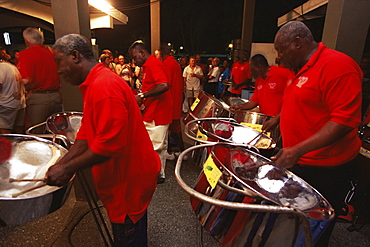 Steel pan band playing at the Sunday School, a street party held in Buccoo, Tobago, West Indies, Caribbean, Central America