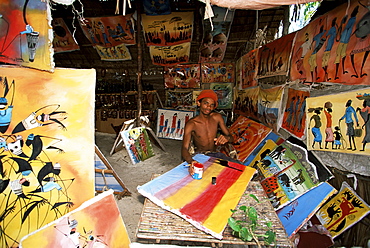 Local artist with his Tingatinga paintings, Zanzibar, Tanzania, East Africa, Africa