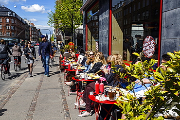 People sitting at the laundromat cafe on Gammel Kongevej, Frederiksberg, Copenhagen, Denmark, Scandinavia, Europe