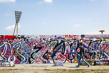 People by the Berlin Wall in Mauerpark, Prenzlauer Berg, Berlin, Germany, Europe