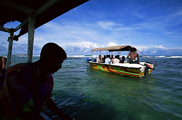 Glass bottom boats near Hikkaduwa taking tourists to the Coral Sanctuary, Sri Lanka, Asia