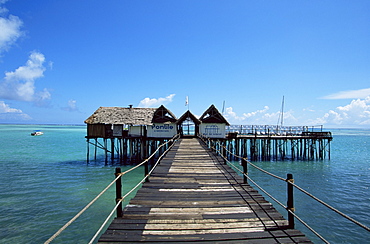 Bridge leading to a bar on the water, Kiwengwa beach, Zanzibar, Tanzania, East Africa, Africa