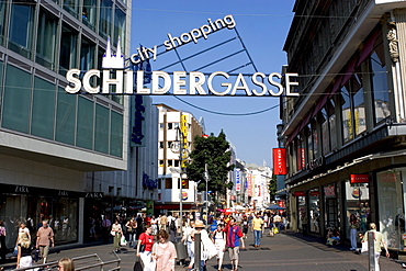 People walking in Schildergasse, a pedestrian street with many shop and restaurants in the city center, Cologne, North Rhine Westphalia, Germany, Europe