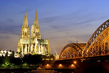 Cologne cathedral, UNESCO World Heritage Site, and Hohenzollern bridge at night, Cologne, North Rhine Westphalia, Germany, Europe