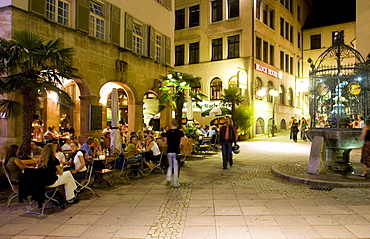 People sitting at outdoor cafes and restaurants, Hans im Gluck Platz, Stuttgart, Baden Wurttemberg, Germany, Europe