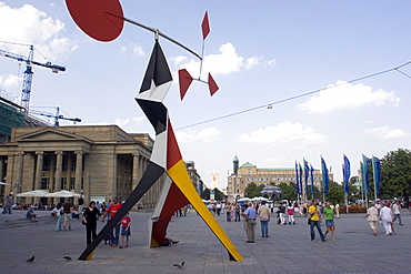 Alexander Calder's mobile statue, and people on Konigstrasse, (King street), pedestrianised main shopping street, Stuttgart, Baden Wurttemberg, Germany, Europe