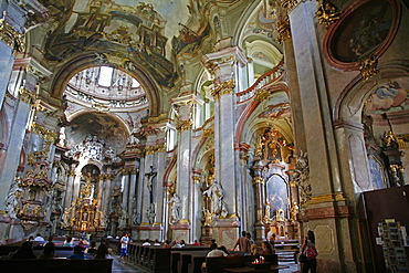 The Baroque interior of St. Nicholas Church in Mala Strana, Prague, Czech Republic, Europe