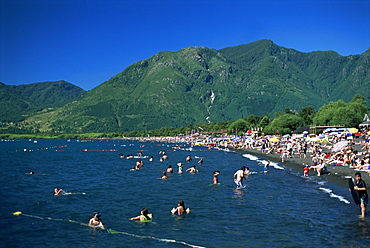 Summer crowds enjoy warm water, Lake Villarica, Lake District, Chile, South America