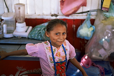 Little girl, Milagro, shows off her dimples, on border with Honduras, Nicaragua, Central America