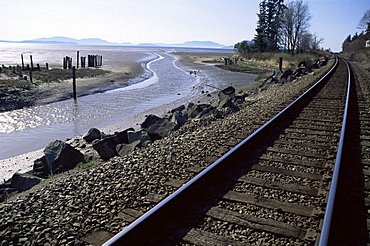 Train tracks leading to Bellingham, with San Juan Islands in distance, Washington State, United States of America (U.S.A.), North America