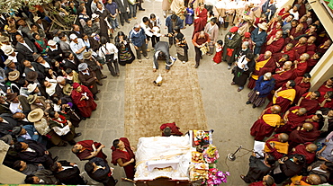 Tibetan Buddhist monks and exiled Tibetan people celebrate Lhosar, the Tibetan new year, Samtenling monastery, next to Boudha or Bodhnath stupa, Kathmandu, Nepal, Asia. 