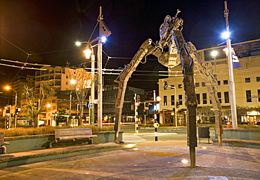 Tripod and movie camera sculpture, at night, reflecting the growing film industry, with the nickname Wellywood, in Wellington, North Island, New Zealand, Pacific