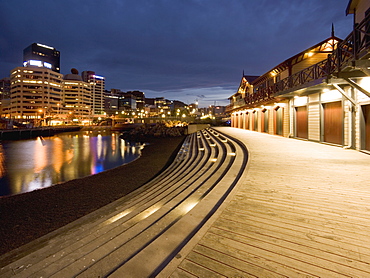 Boat sheds and sea front at dawn, Wellington, North Island, New Zealand, Pacific