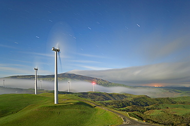 A long exposure by moonlight of windmills in Te Apiti Wind Farm, Palmerston North, Manawatu, North Island, New Zealand, Pacific