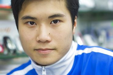 Portrait of young Chinese man, Hong Kong, China, Asia