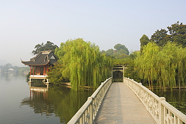 Bridge and pavilion, West Lake, Hangzhou, Zhejiang Province, China, Asia