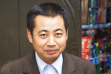 Portrait of Chinese shop owner, Huangshan City (Tunxi), Anhui Province, China, Asia