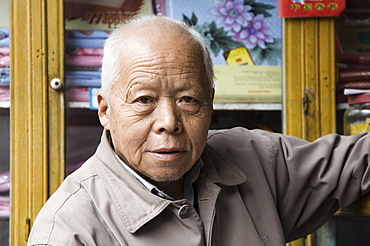 Portrait of Chinese shop owner, Huangshan City (Tunxi), Anhui Province, China, Asia