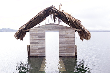 High water floods lakeside cabanas, Climate Change, Lago Peten Itza, Guatemala, Central America