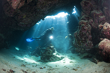 Scuba Diver inside Cave, Cave Reef, Red Sea, Egypt