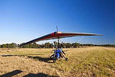 Tourists flying with ultralight trike, Mbotyi, Eastern Cap, South Africa