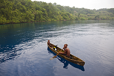 Local People in typical Dugout Canoe, Russell Islands, Solomon Islands