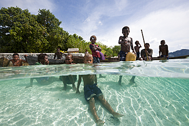 Children playing in Lagoon, Florida Islands, Solomon Islands