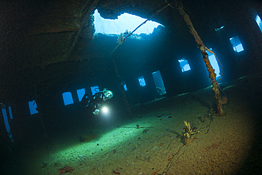 Scuba Diver inside Umbria Wreck, Wingate Reef, Red Sea, Sudan