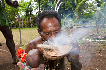 Demonstration of making fire, Tufi, Oro Province, Papua New Guinea