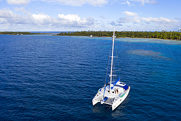 Catamaran at Ahe Atoll, Tuamotu Archipel, French Polynesia