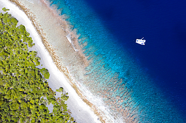 Catamaran at Kauehi Atoll, Tuamotu Archipel, French Polynesia