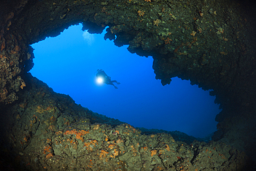 Scuba Diver inside Green Cave, Vis Island, Mediterranean Sea, Croatia