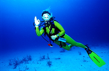 Scuba diver shows o.K. signal, Bahamas, Caribbean Sea, Grand Bahama Island