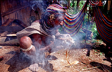 Huli makes fire, Papua New Guinea, Tari, Huli, Highlands