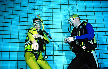 scuba diving lessons in a swimming pool, reaching regulator, Germany, Munich, Olympiabad