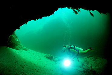 Cave diving, Scuba diver in underwater cave, Bahamas, Freshwater Blue hole