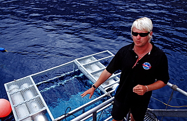 Diving guide and shark cage, Guadalupe, Mexico, Pacific ocean, North America