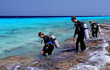 People preparing to dive, Netherlands Antilles, Bonaire, Caribbean Sea