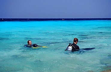 People preparing to dive, Netherlands Antilles, Bonaire, Caribbean Sea