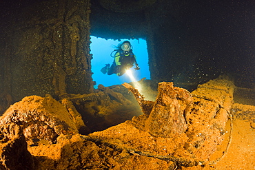 Diver discover Teapot inside of HIJMS Nagato Battleship, Marshall Islands, Bikini Atoll, Micronesia, Pacific Ocean