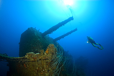 Diver and Twin 8-inch 55 caliber Gun on USS Saratoga, Marshall Islands, Bikini Atoll, Micronesia, Pacific Ocean