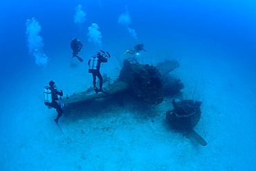 Diver and Bomber near to USS Saratoga, Marshall Islands, Bikini Atoll, Micronesia, Pacific Ocean