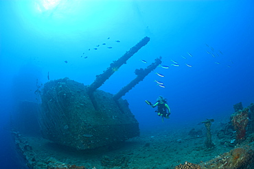 Diver and Twin 8-inch 55 caliber Gun on USS Saratoga, Marshall Islands, Bikini Atoll, Micronesia, Pacific Ocean